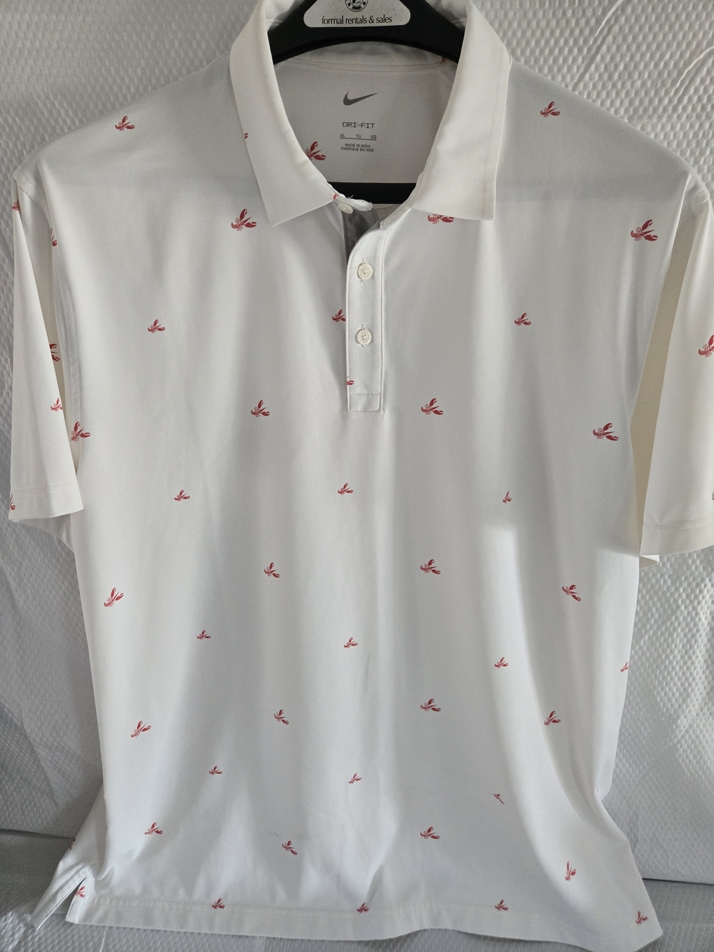 Nike Men’s White Dri-FIT Polo with Red Micro Print